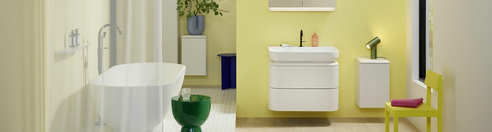 Farfrohes Badzimmer mit formrunden b:me-Komponenten  